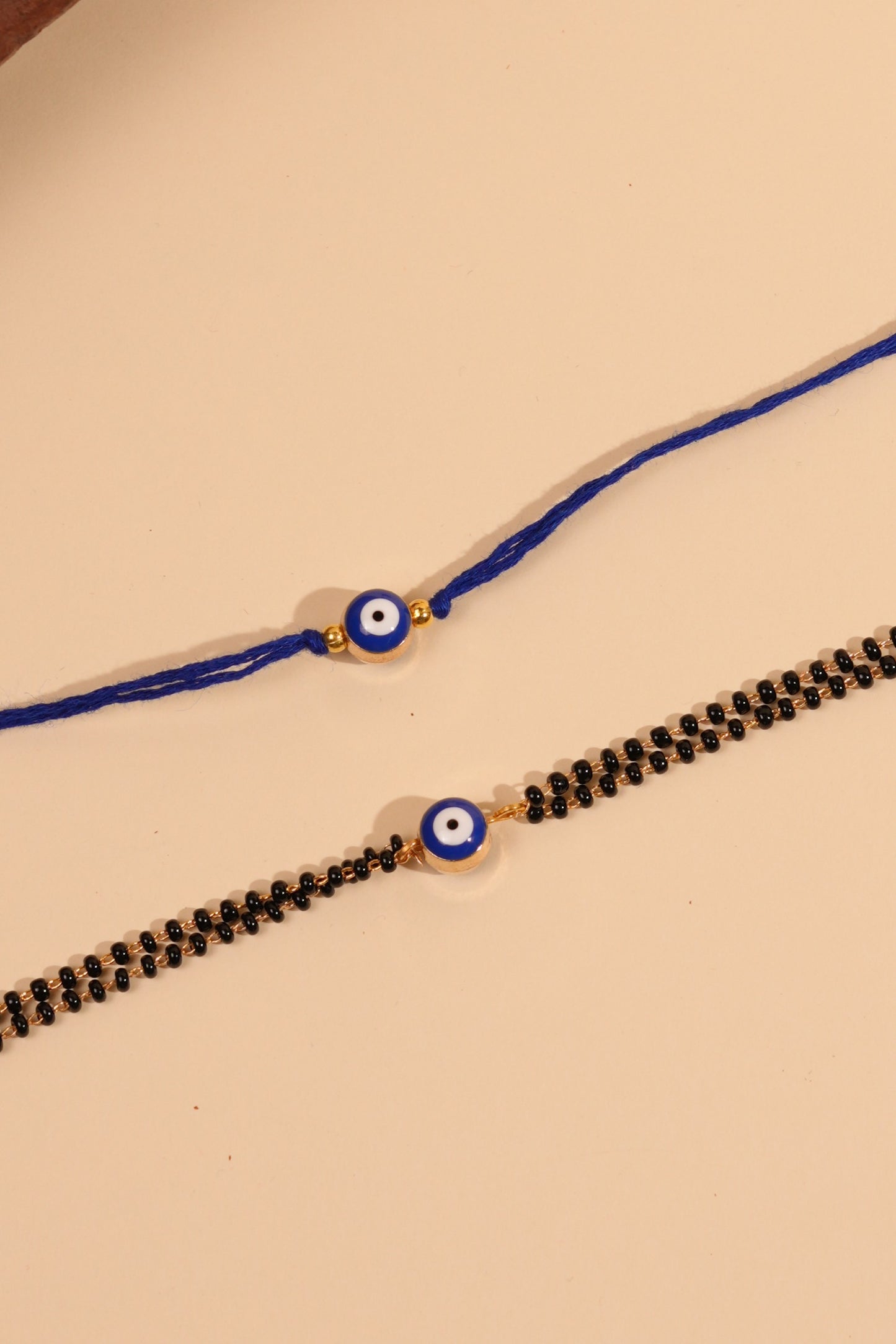 Round Evil Eye Bhaiya Bhabhi Rakhi Set