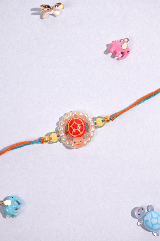 Orange Glow In Dark Turtle Kids Rakhi