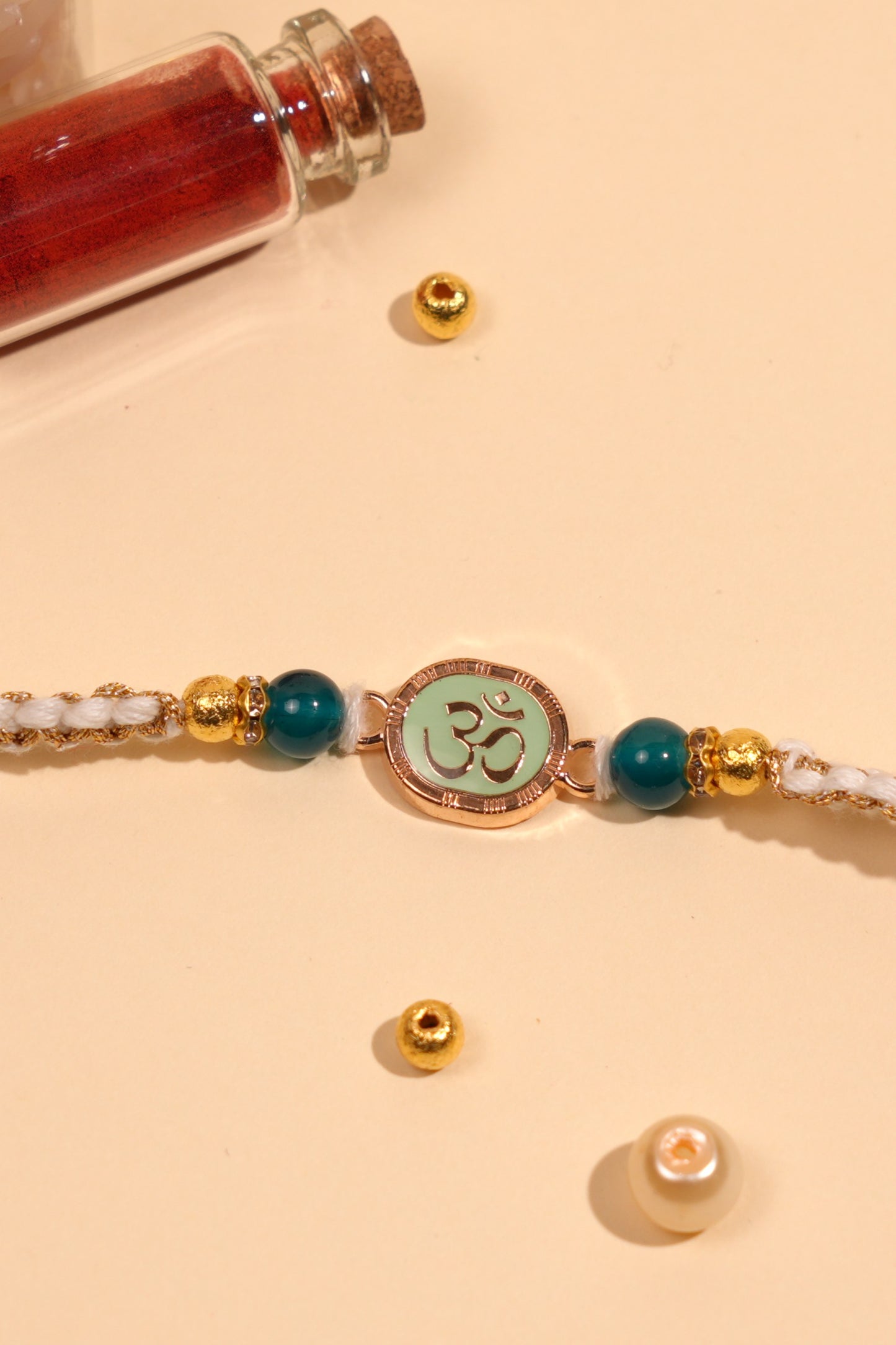 Teal Om Bhai Rakhi
